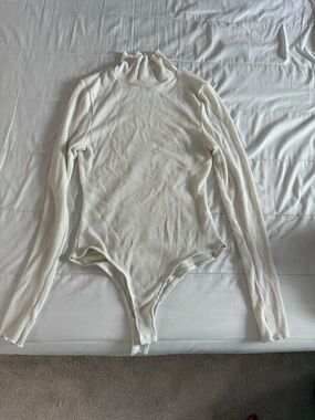 Free People Ribbed Turtleneck Bodysuit in Off-White